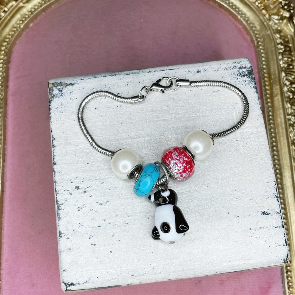 4081. Art Glass Penguin Bracelet